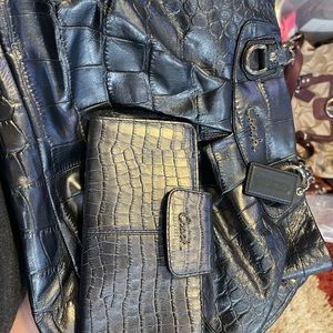 Coach metallic/pearlescent blue reptile purse.  Like new. Smoke free/pet free